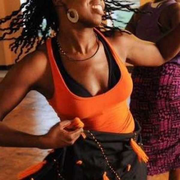 black woman joyful dancing